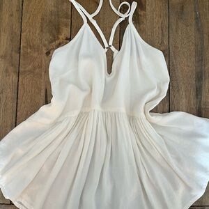 Stylish White Sleeveless Blouse